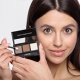 Model holding the powder kit